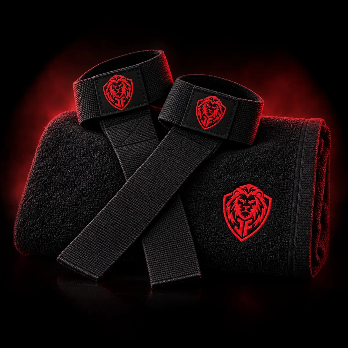 Black JohnoFitness gym towel and lifting straps with red lion shield